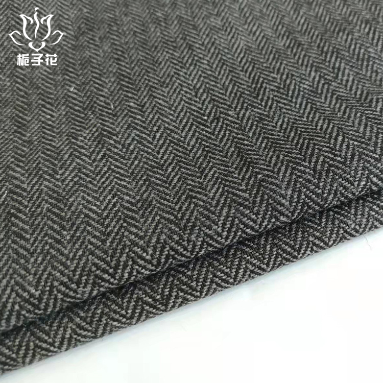 黑灰色50%羊毛小人字呢面料
