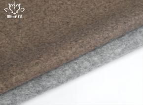 全涤纶混棕色龙凤呢面料